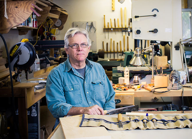 Woodworker Gene Kelly in Workshop with tools displayed